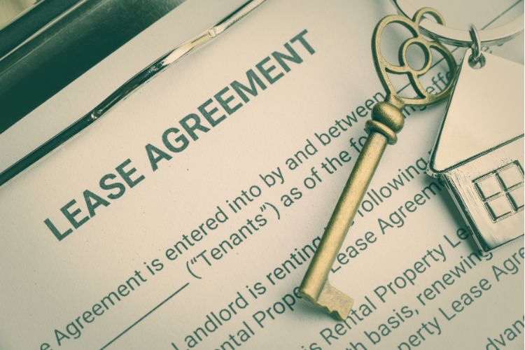 A Picture of a Lease Agreement on a Clipboard