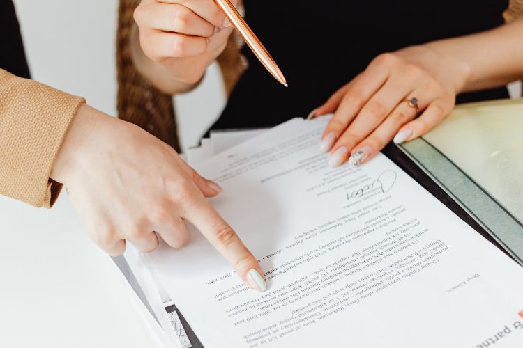 Subtenant Signing Paperwork to Rent Out a Property From a Tenant